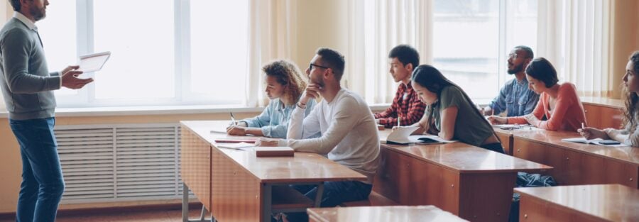 NLP Practitioner developing group influence skills with a seated group