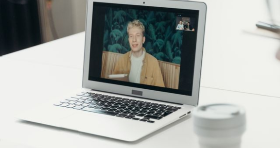 Participant presenting during a live online NLP Trainer's Training session